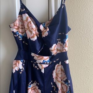 Navy blue jumpsuit with flower design